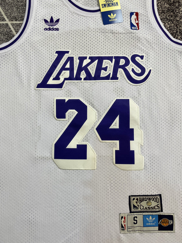 White LA Lakers basketball jersey, front graphic detail