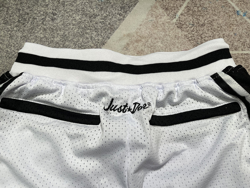 White and Black LA Lakers premium basketball shorts, waistband and label detail