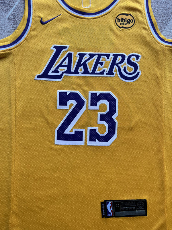 Yellow LA Lakers basketball jersey, front graphic detail