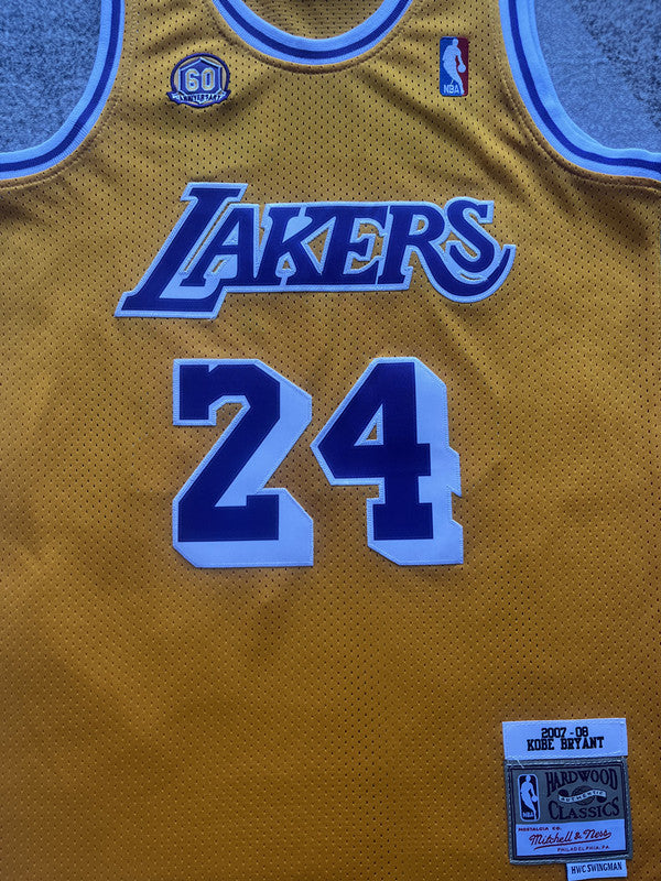 Yellow LA Lakers basketball jersey, front graphic detail