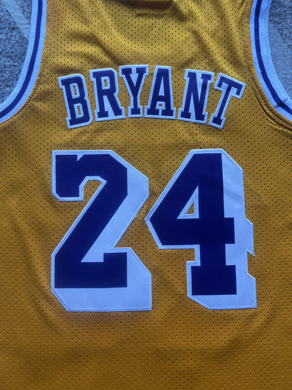 Yellow LA Lakers basketball jersey, back lettering and number detail