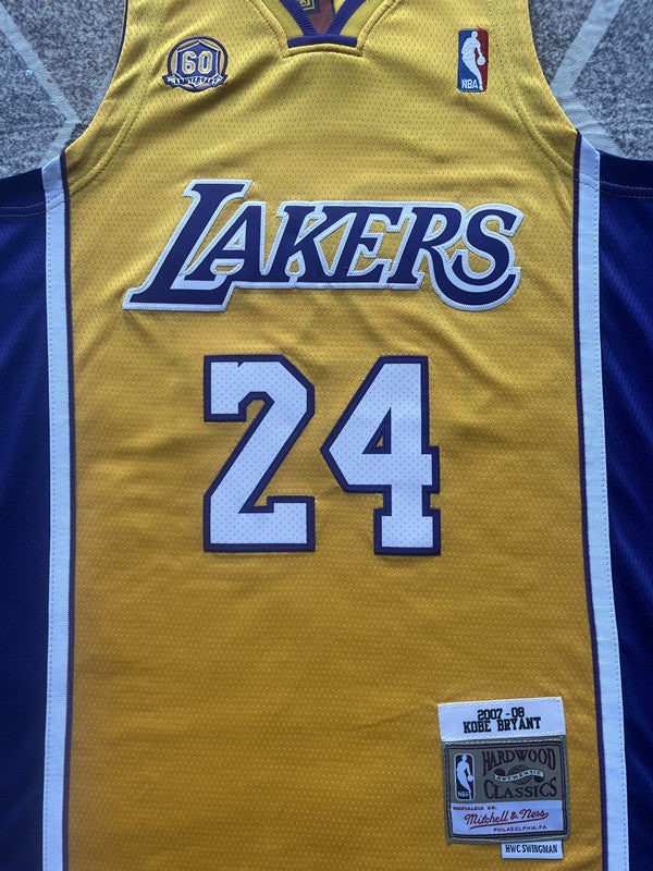 Yellow LA Lakers basketball jersey, front graphic detail