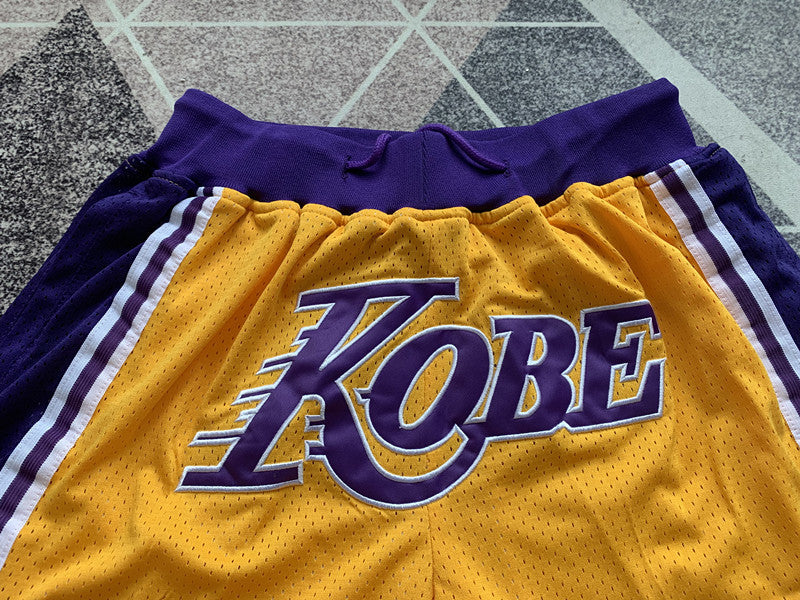 Yellow LA Lakers premium basketball shorts, graphic detail