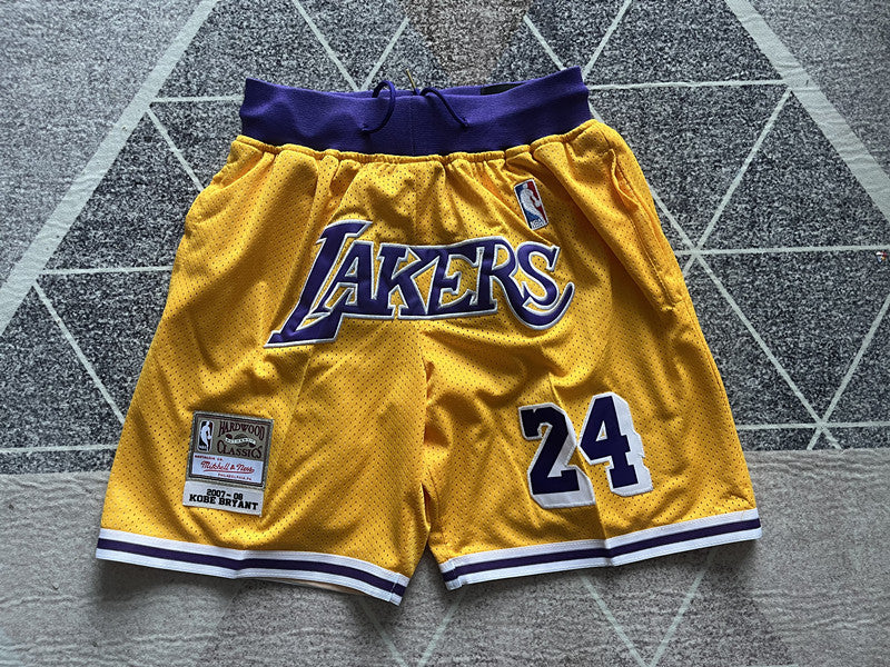 Yellow LA Lakers premium basketball shorts, full front view