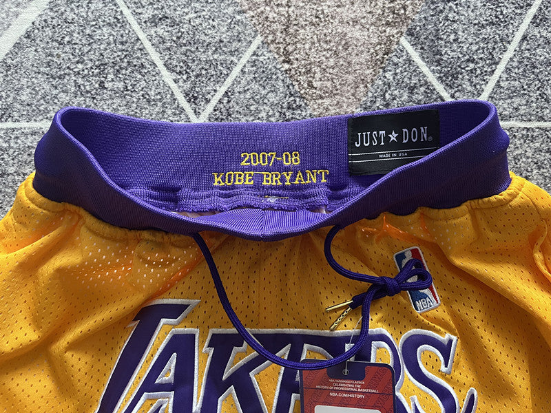 Yellow LA Lakers premium basketball shorts, waistband and label detail