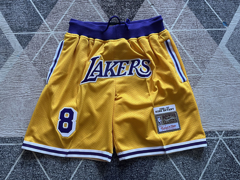 Yellow LA Lakers premium basketball shorts, full front view