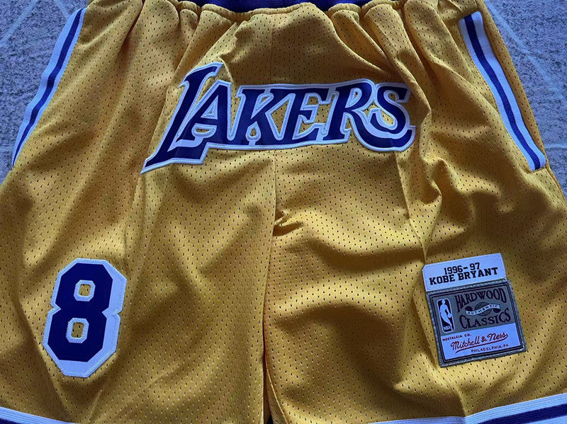 Yellow LA Lakers premium basketball shorts, waistband and label detail