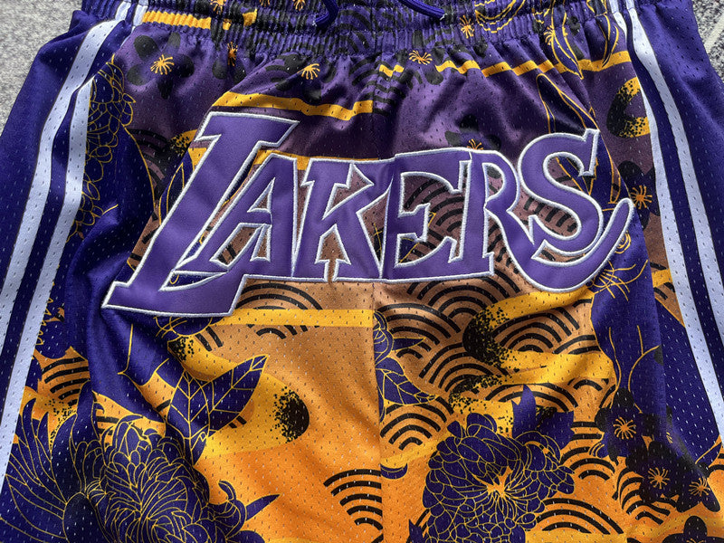 Yellow LA Lakers premium basketball shorts, waistband and label detail