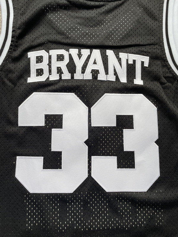 Black Lower Merion basketball jersey, back lettering and number detail
