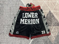 Black Lower Merion premium basketball shorts, full front view