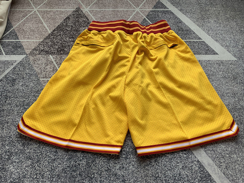 Yellow Lower Merion premium basketball shorts, full back view