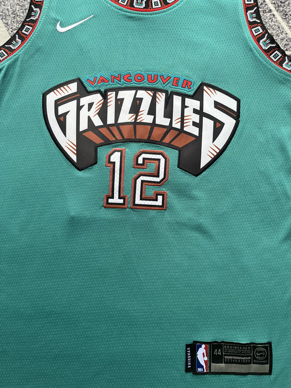 Green Memphis Grizzlies basketball jersey, front graphic detail