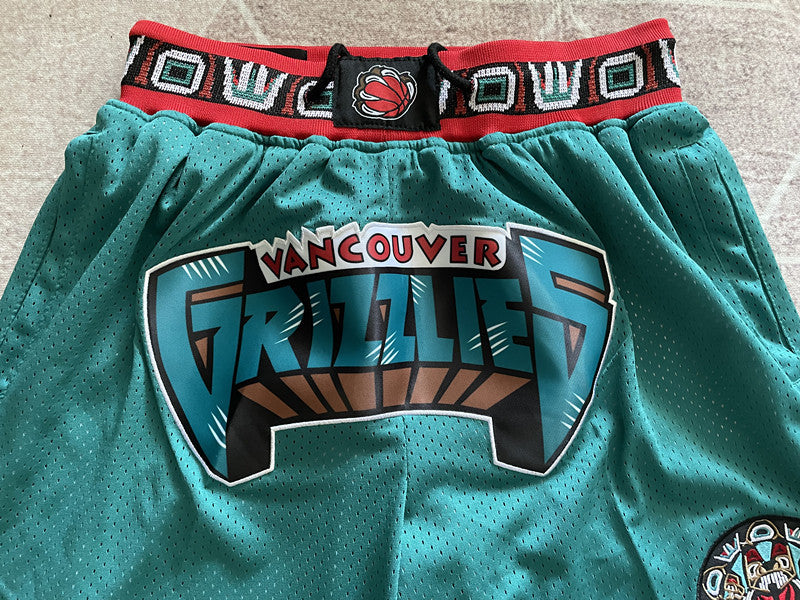 Green Memphis Grizzlies premium basketball shorts, graphic detail