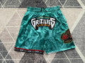 Green Memphis Grizzlies premium basketball shorts, full front view