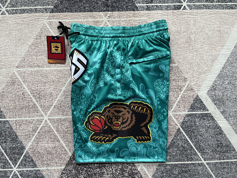 Green Memphis Grizzlies premium basketball shorts, side panel detail