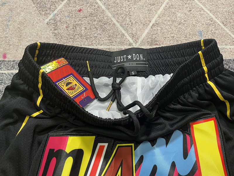 Black Miami Heat premium basketball shorts, waistband and label detail
