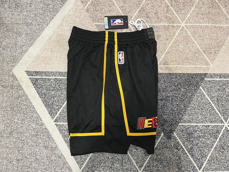 Black Miami Heat basketball shorts, side panel detail