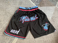 Black Miami Heat premium basketball shorts, full front view