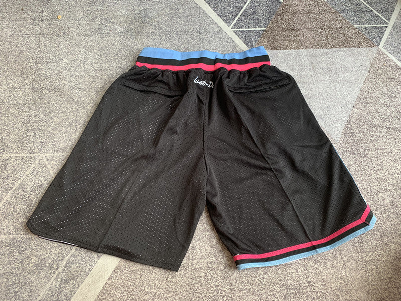 Black Miami Heat premium basketball shorts, full back view