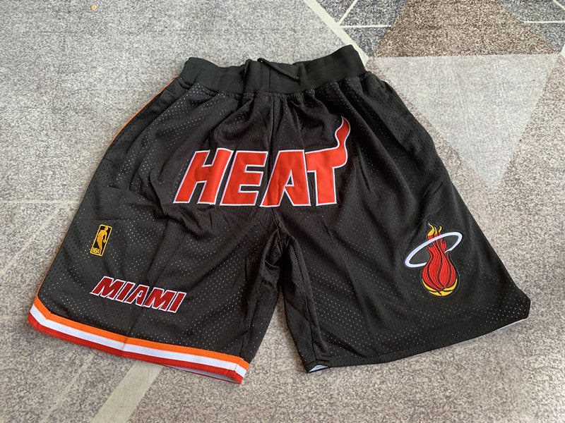Black Miami Heat premium basketball shorts, full front view