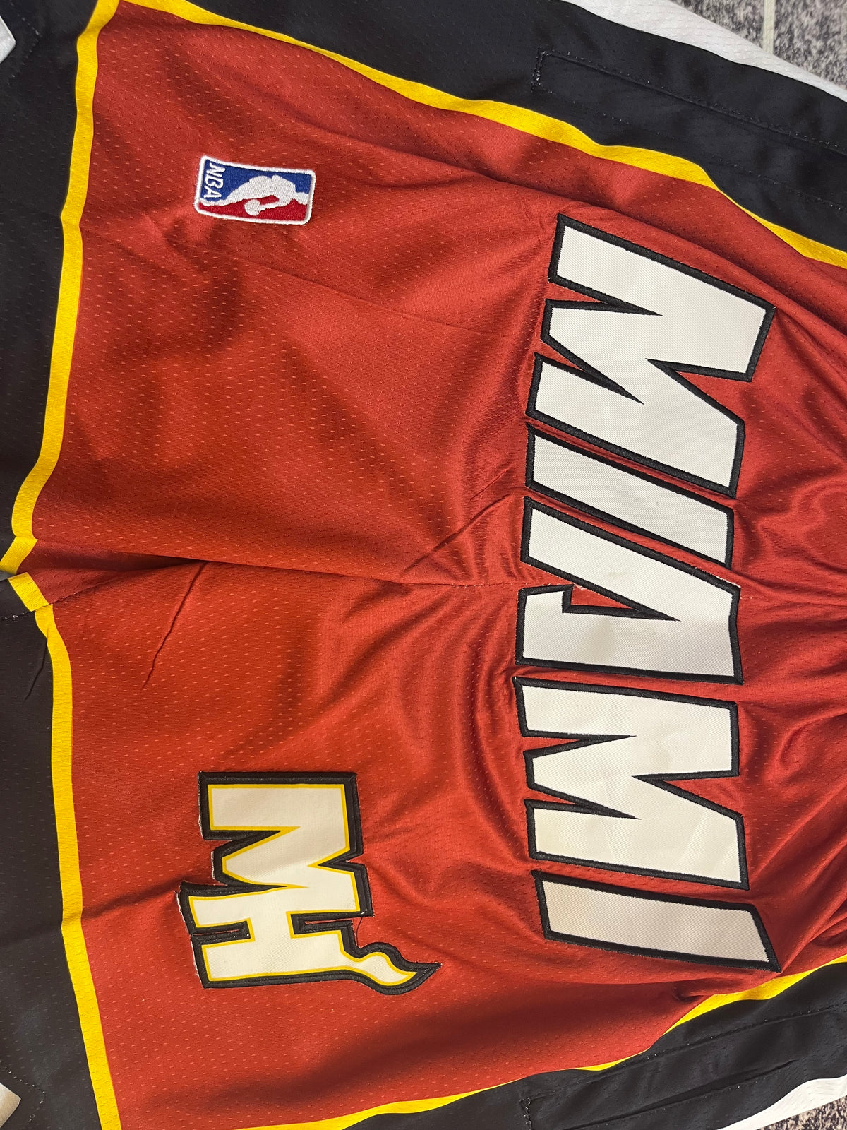 Maroon Miami Heat premium basketball shorts, graphic detail