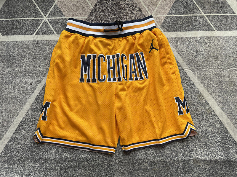 Yellow Michigan premium basketball shorts, full front view