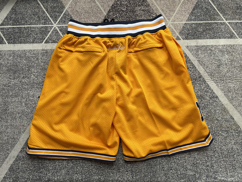 Yellow Michigan premium basketball shorts, full back view