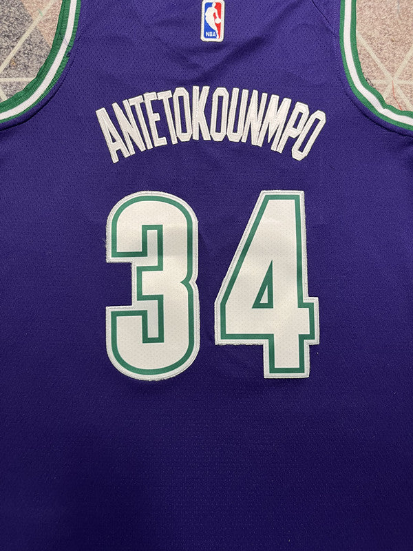Purple Milwaukee Bucks basketball jersey, back lettering and number detail