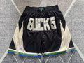 Black Milwaukee Bucks premium basketball shorts, full front view