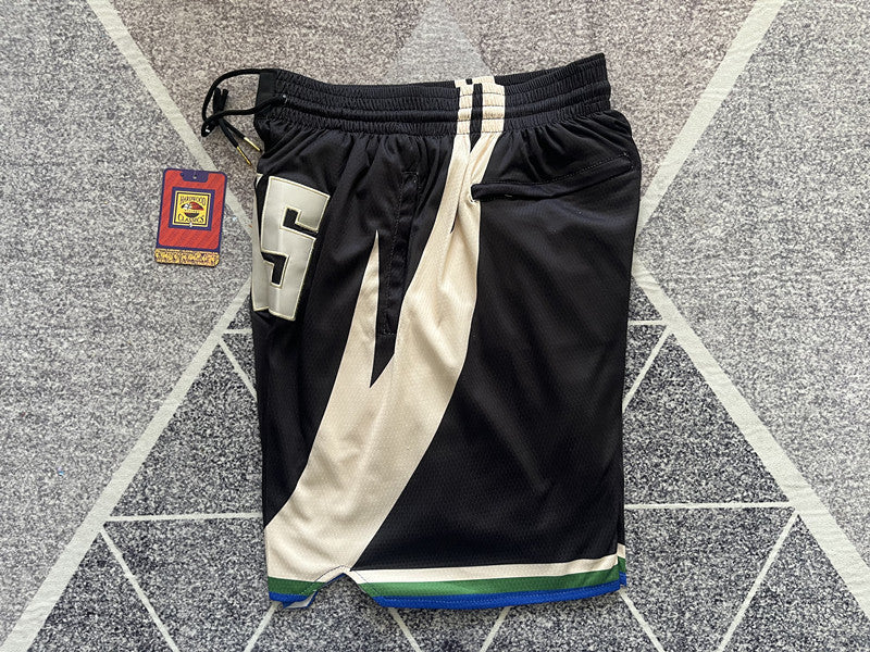 Black Milwaukee Bucks premium basketball shorts, side panel detail