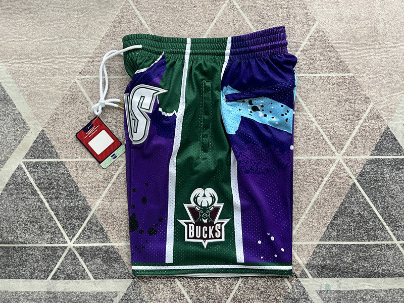 Multi-color Milwaukee Bucks premium basketball shorts, side panel detail