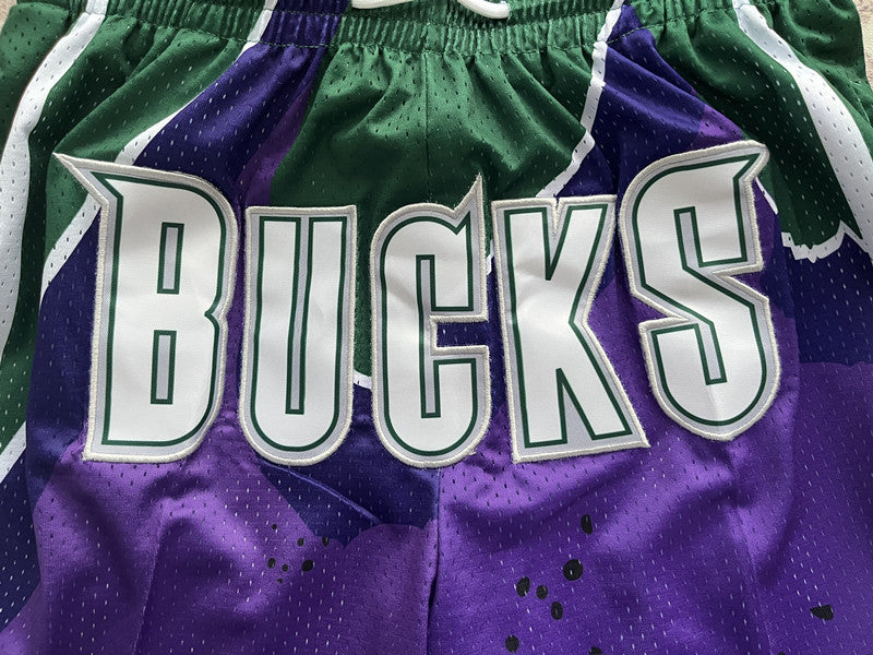 Multi-color Milwaukee Bucks premium basketball shorts, waistband and label detail