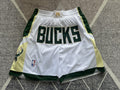 White Milwaukee Bucks premium basketball shorts, full front view