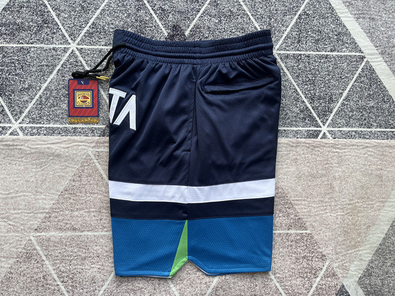 Navy Minnesota Timberwolves premium basketball shorts, side panel detail