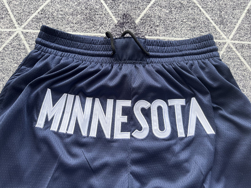 Navy Minnesota Timberwolves premium basketball shorts, waistband and label detail