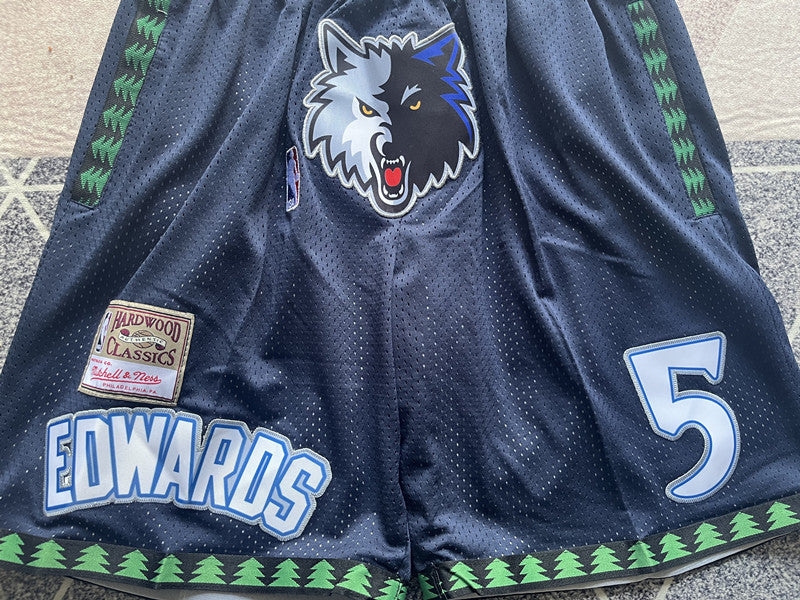 Navy Minnesota Timberwolves premium basketball shorts, waistband and label detail