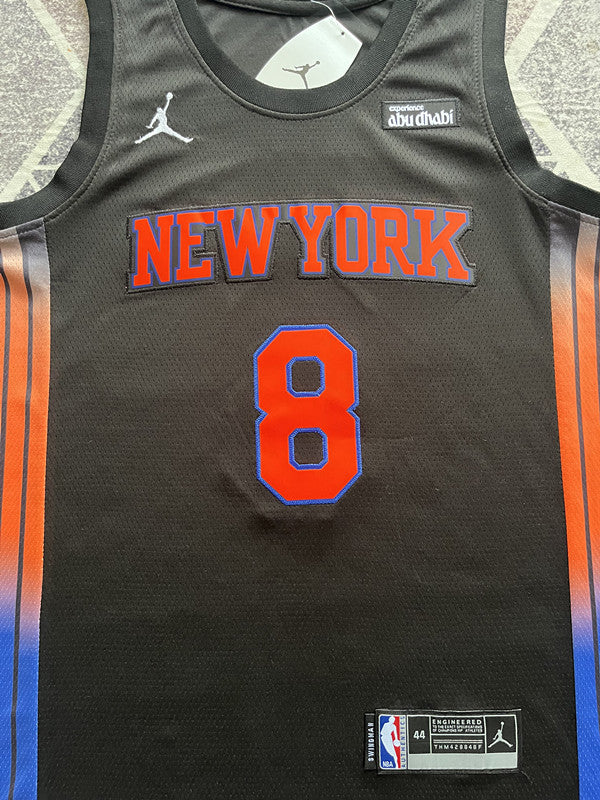 Multi-color New York Knicks basketball jersey, front graphic detail