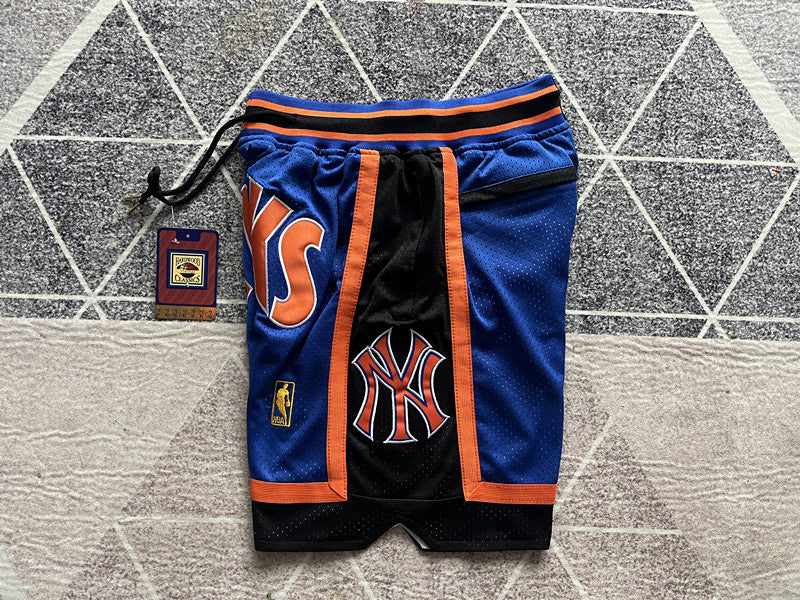 Blue New York Knicks premium basketball shorts, side panel detail