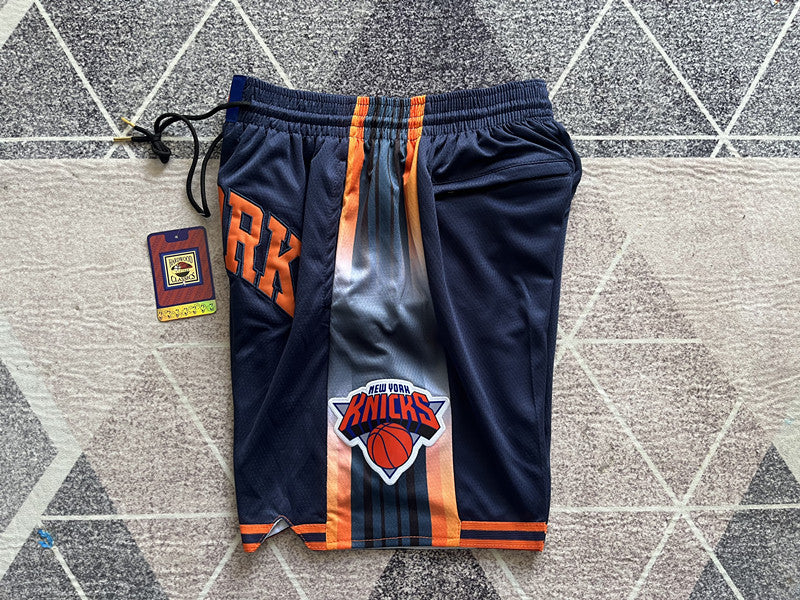 Navy New York Knicks premium basketball shorts, side panel detail