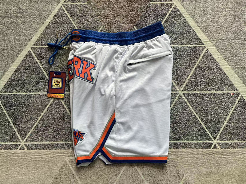 White New York Knicks premium basketball shorts, side panel detail