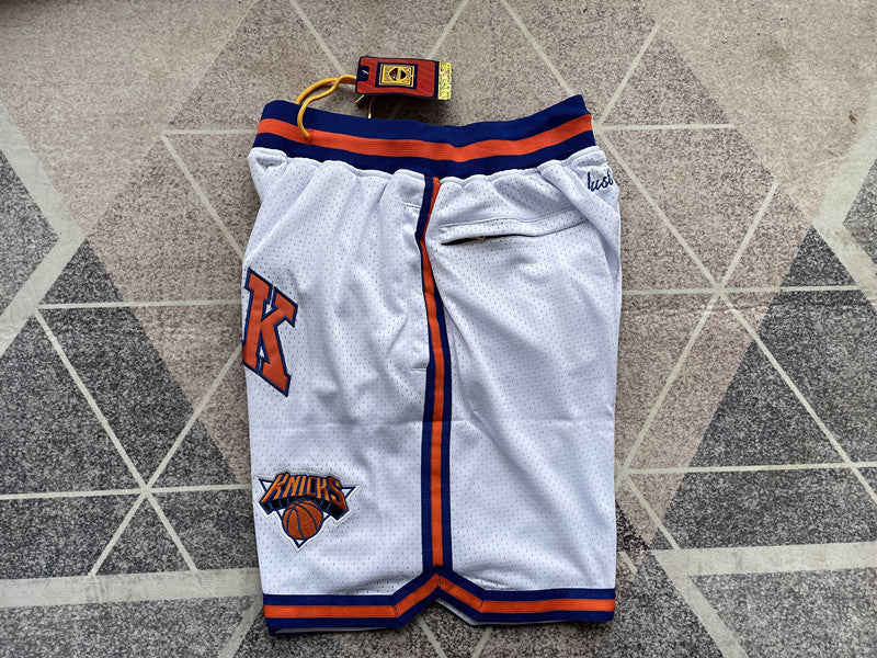 White New York Knicks premium basketball shorts, side panel detail