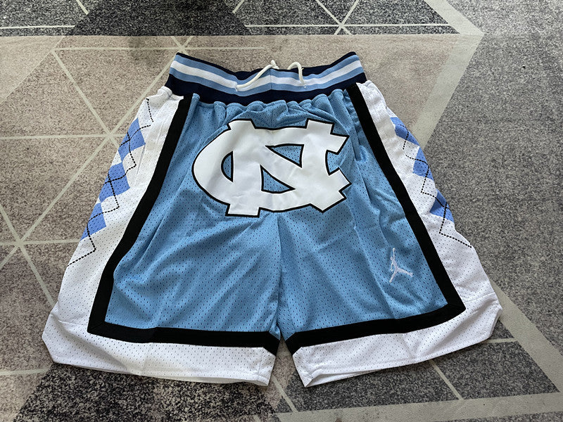 Blue North Carolina premium basketball shorts, full front view