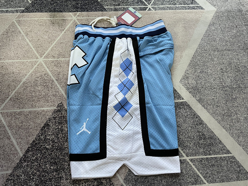Blue North Carolina premium basketball shorts, side panel detail