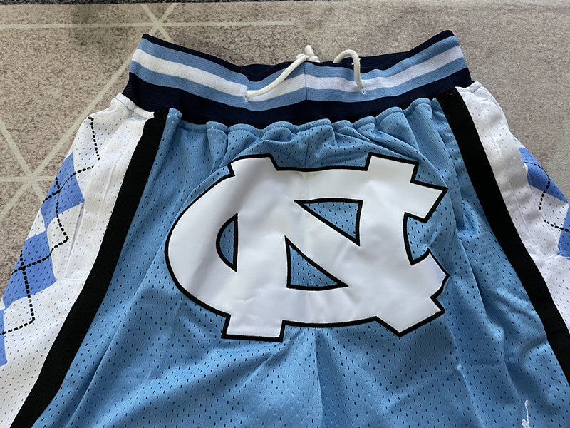 Blue North Carolina premium basketball shorts, graphic detail