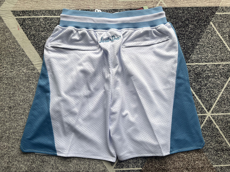 White North Carolina premium basketball shorts, full back view