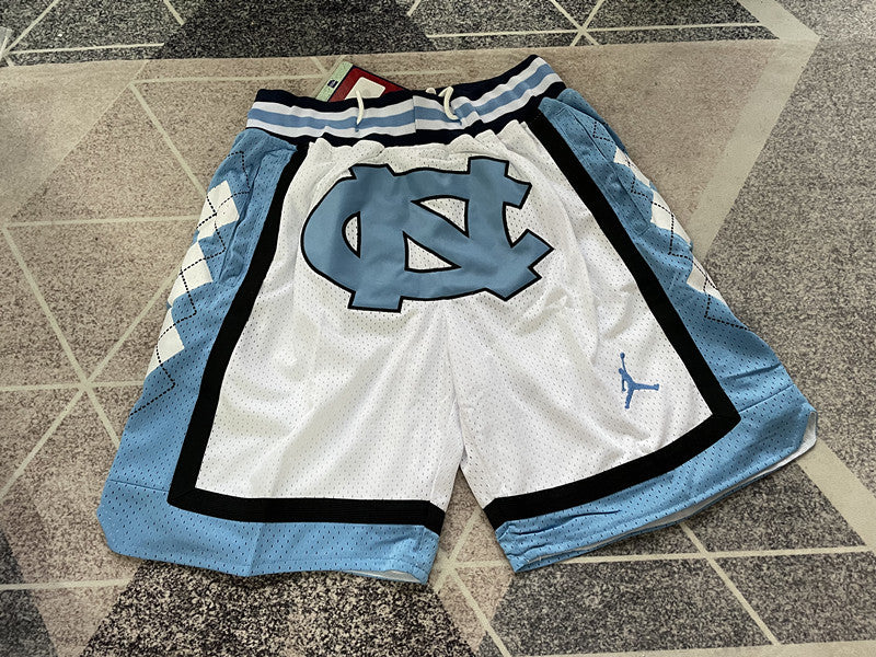 White North Carolina premium basketball shorts, full front view