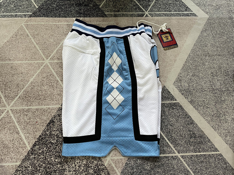 White North Carolina premium basketball shorts, side panel detail