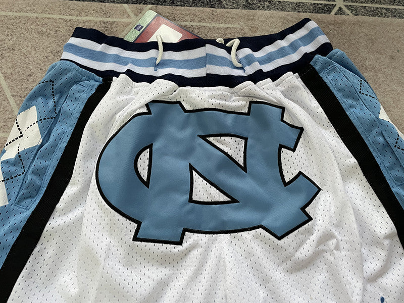 White North Carolina premium basketball shorts, graphic detail