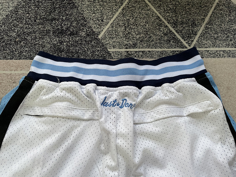 White North Carolina premium basketball shorts, waistband and label detail