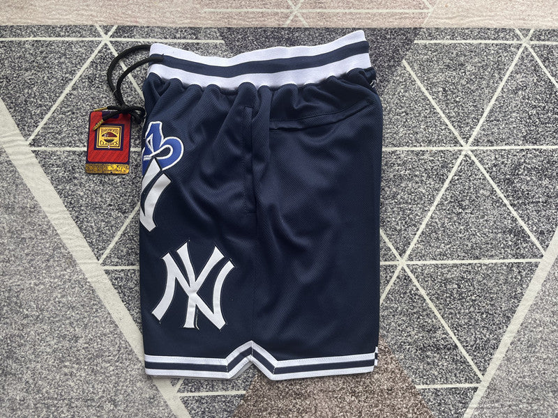 Navy New York Yankees premium basketball shorts, side panel detail